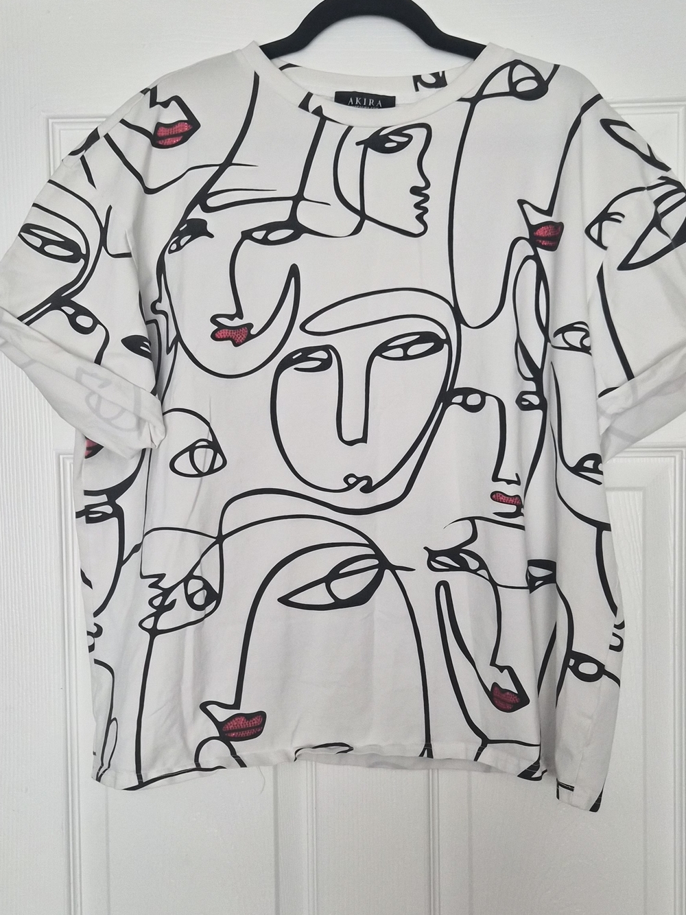 AKIRA Abstract Face Graphic Tee — White with Black & Pink Accents